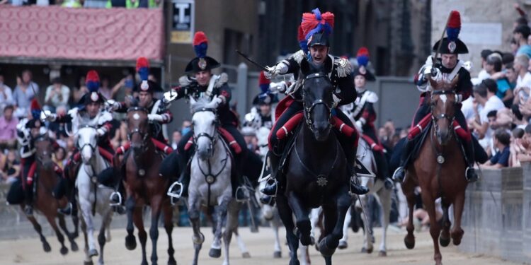 Col fantino Grandine sul cavallo Canarinu